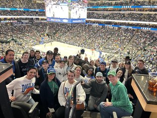 Group of people at a basketball game