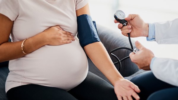 What is eclampsia, and how is it different from preeclampsia?