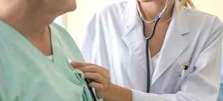 Doctor examining a patient with a stethoscope