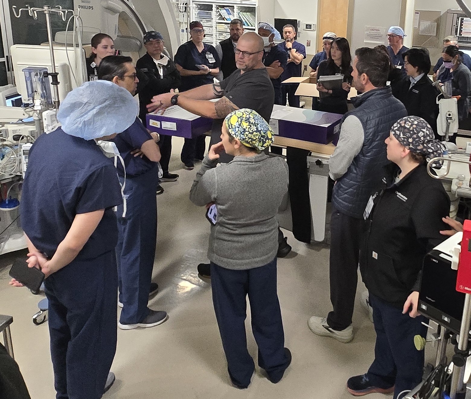 The medical team gathers in the operating room prior to the patient's procedure