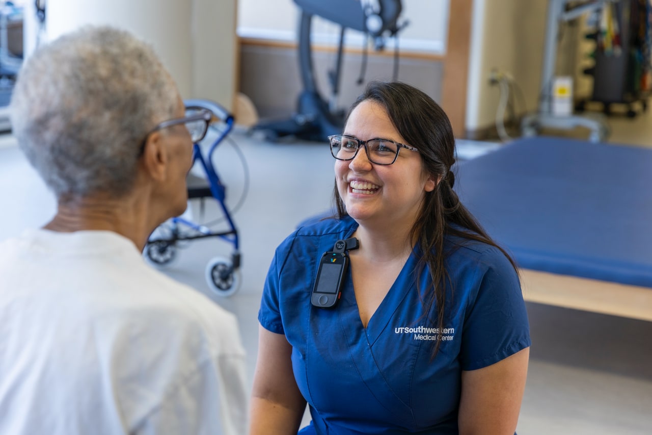 Therapist works with patient