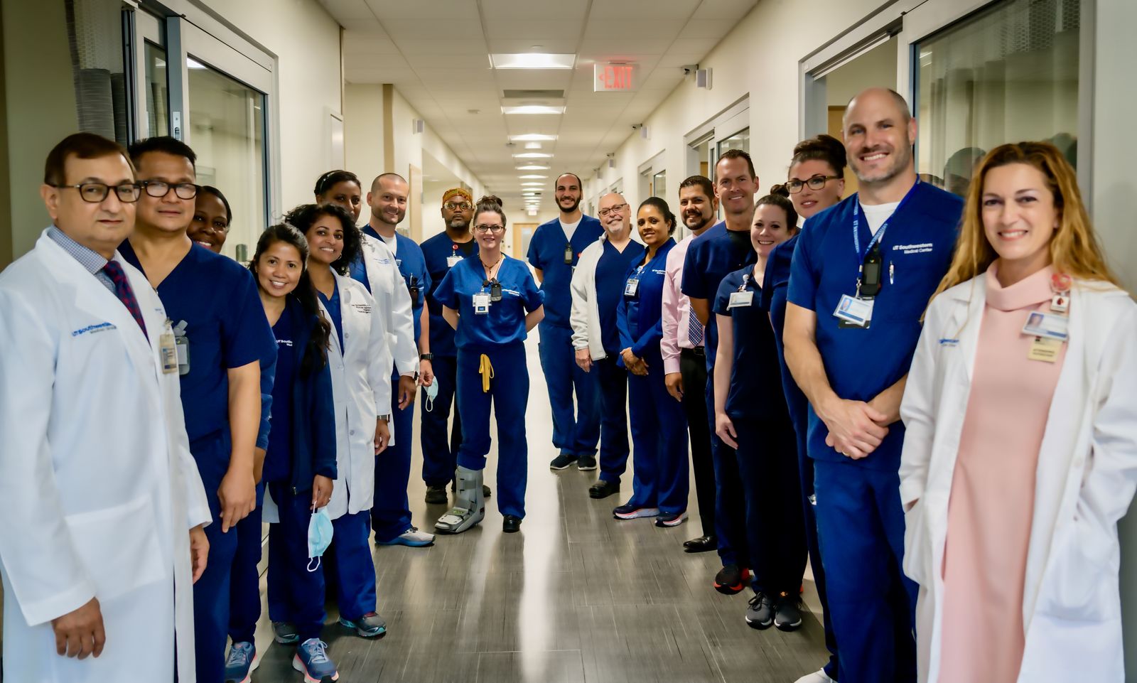the apheresis team standing in a hallway