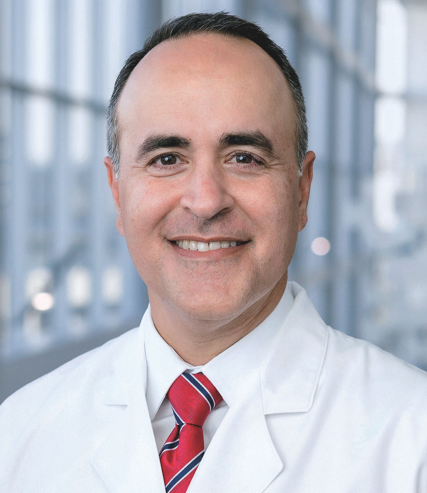 Dr. Amit Khera