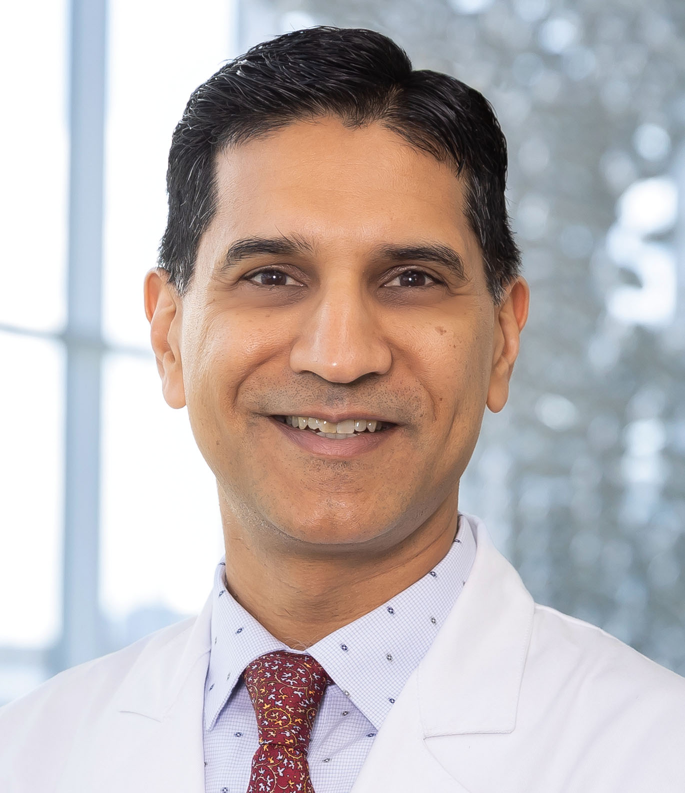 Dr. Amil M. Shah