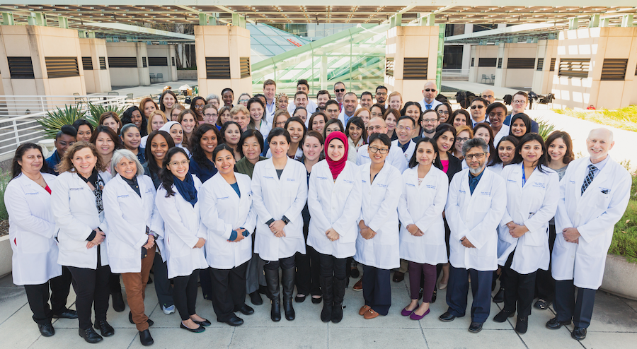 Family Community Medicine doctors posing together for a photo.