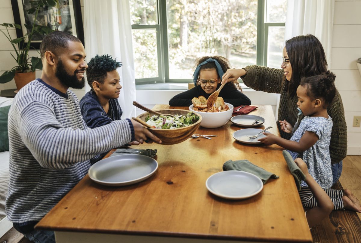 Family eating meal together.