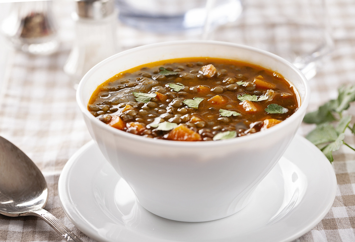 Lentil soup in a white bowl