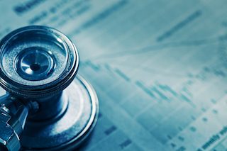 A stethoscope resting on a document