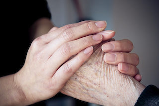 Close-up of hands in prayer