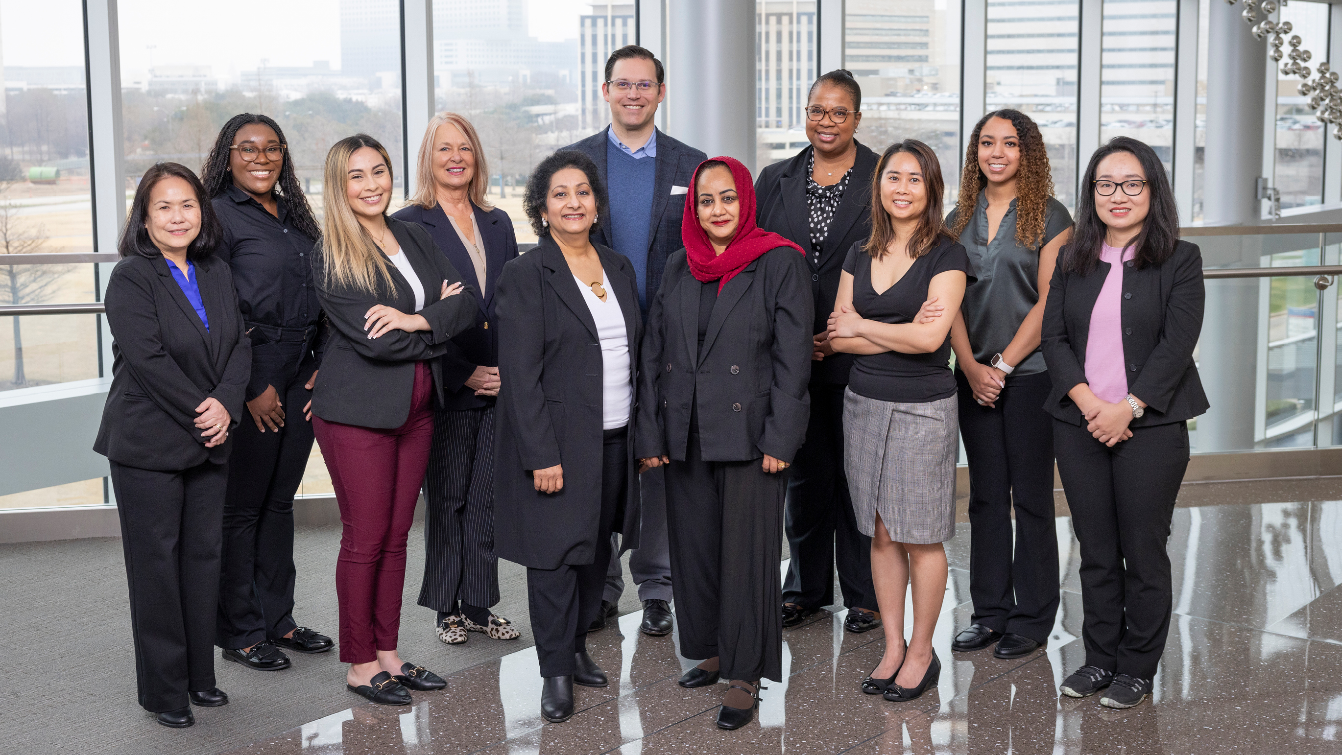Group photo with the following individuals standing left to right: Adel Cunningham, D.N.P., RN, CLSSGB; Adeyemi Adeniran, B.S.; Elisa Arias; Linda Denke, Ph.D., RN, CCRC; Shirley George, B.S.N., RN; Manuel Sosa, M.S.F., M.S.E.; Rehab Hassanein, M.B.B.S.; Ramona Baucham, Ph.D., M.S.N., M.S.O.R.D., RN; Teresa Phan, M.S.H.C.M., M.S.I.T.M., CLSSGB, PMP; Haley Bush, B.S.; Yingzi Zhang, Ph.D., RN
