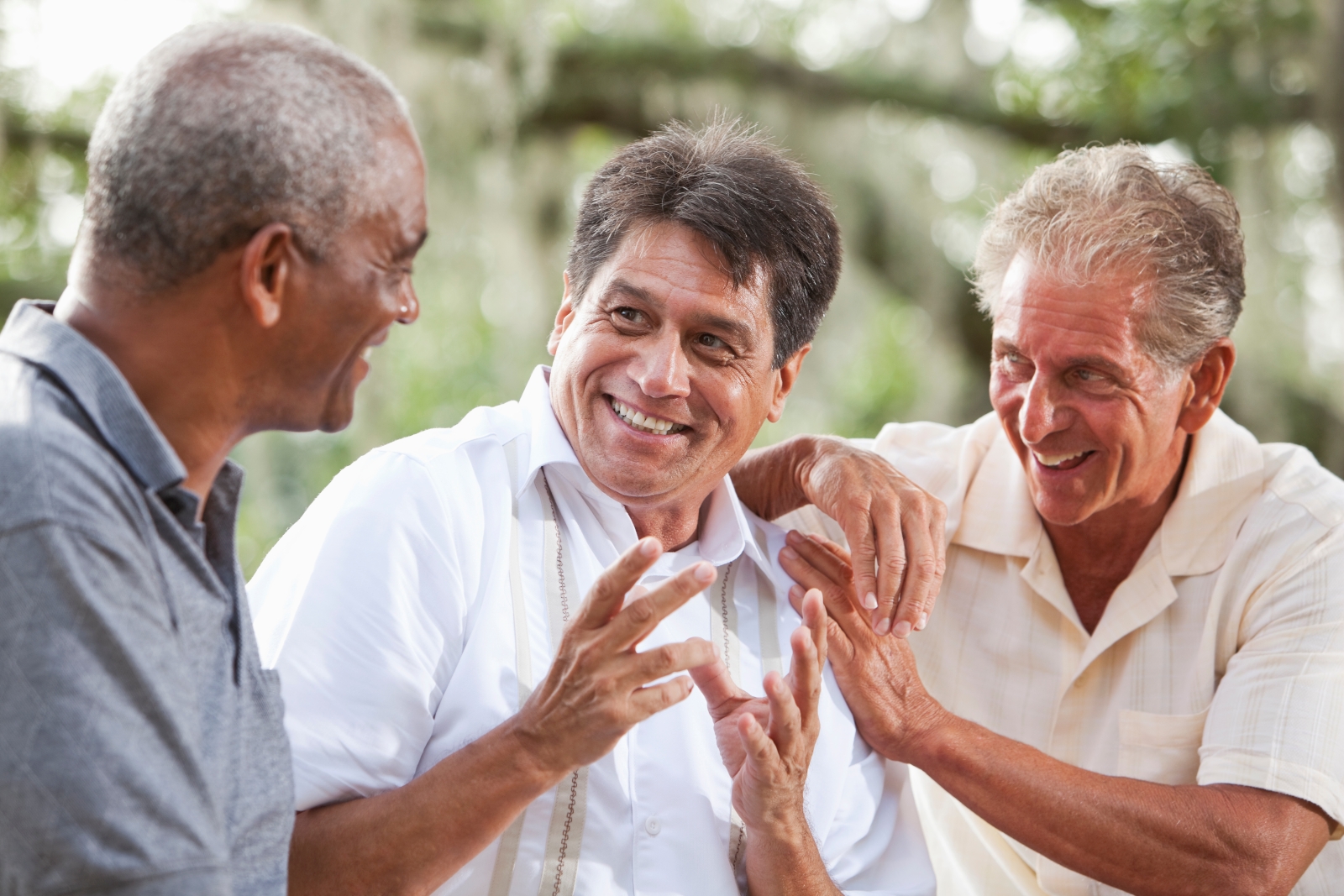 Three male friends talking