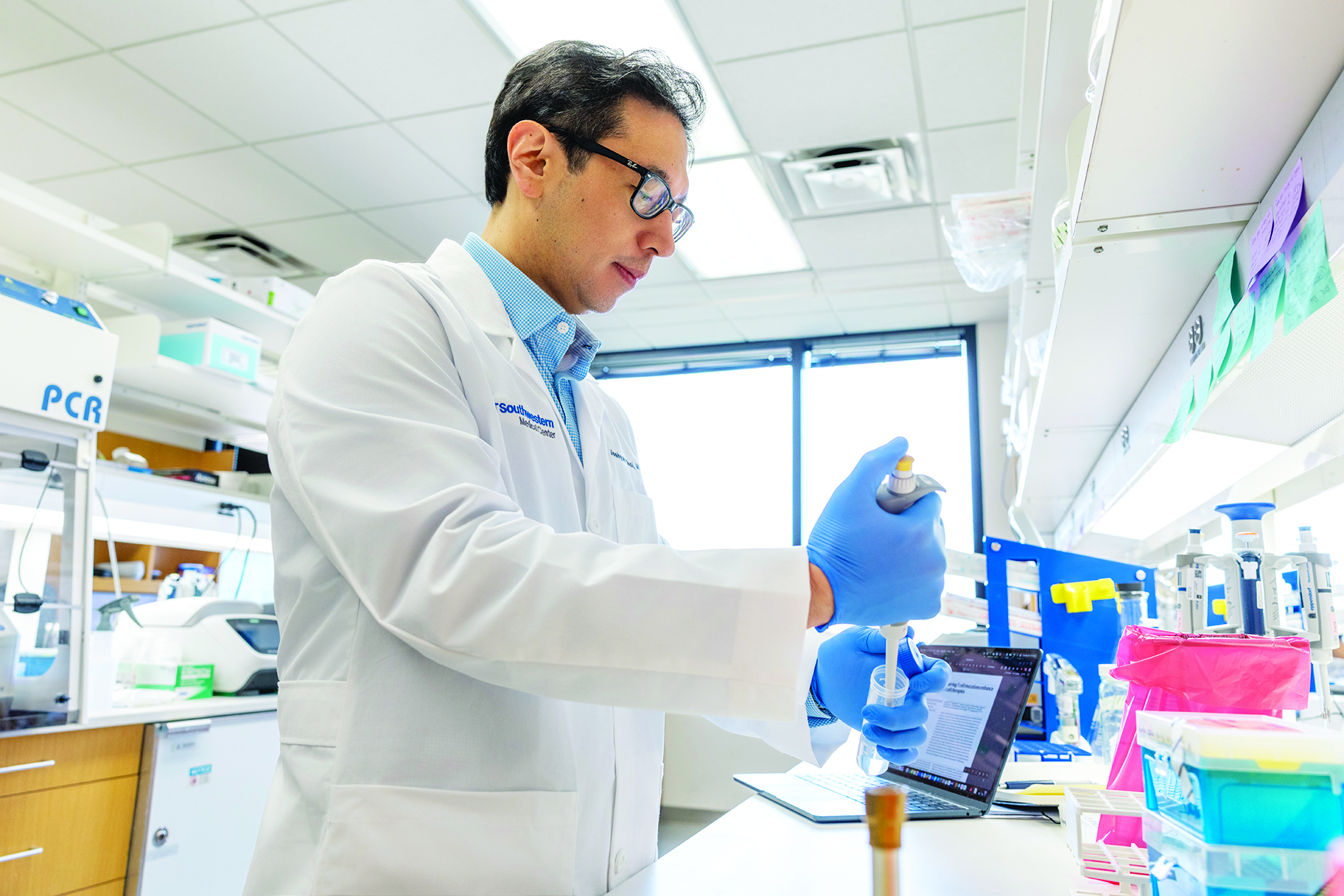 Jaehyuk Choi, M.D., Ph.D., in lab