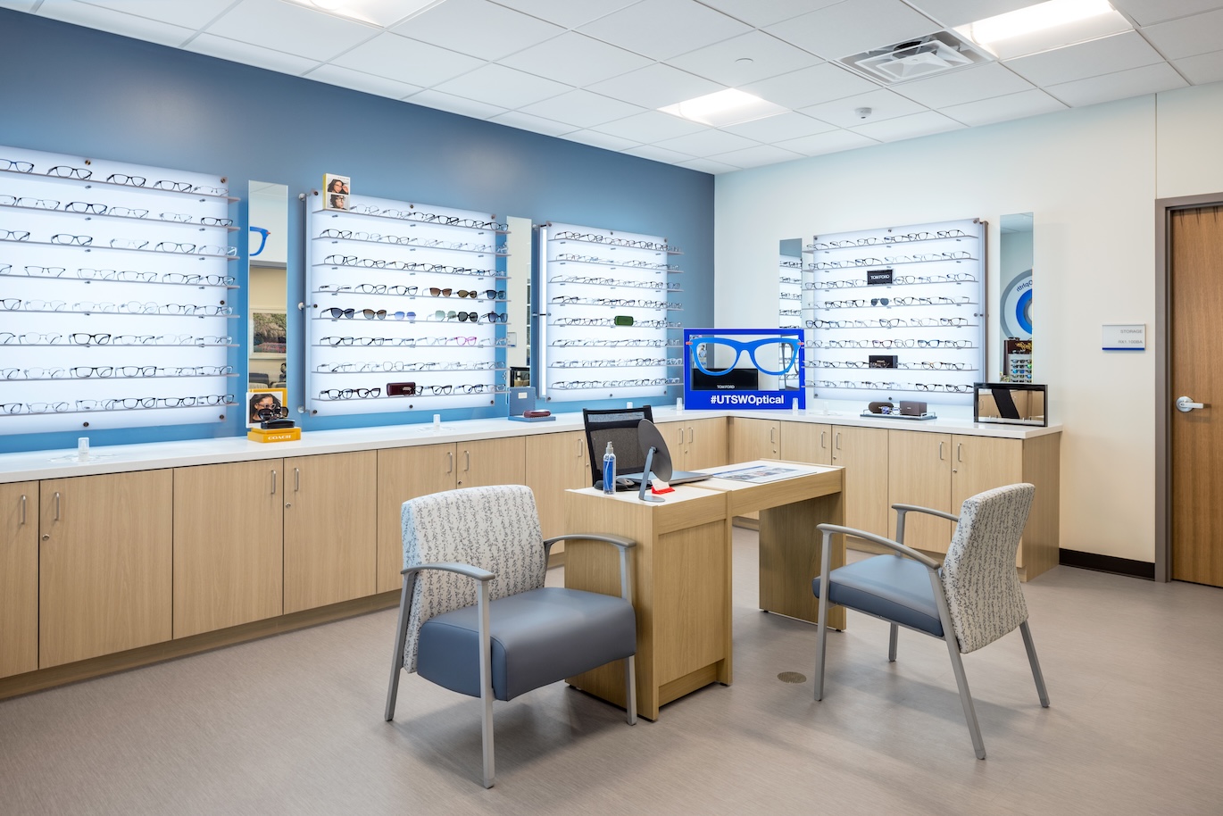 Interior of optical shop, with glasses and a desk