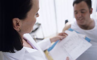 Provider holding clipboard