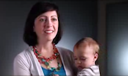 mother holding baby