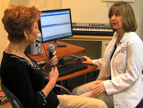 Janis Deane, M.Ed., CCC-SLP, performs acoustic studies on a patient with vocal tremor.
