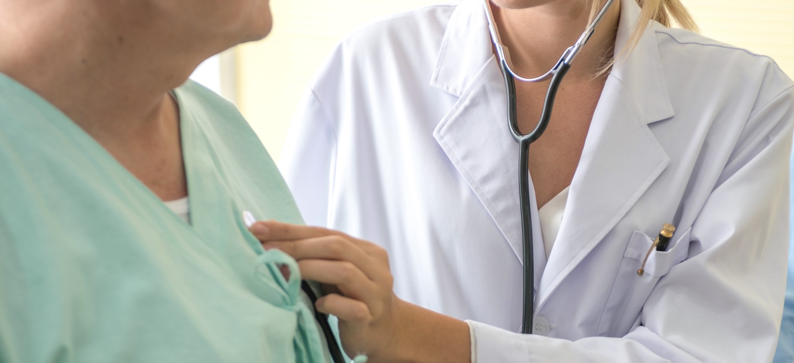 Doctor examining a patient with a stethoscope