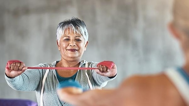 Older woman in an exercise class