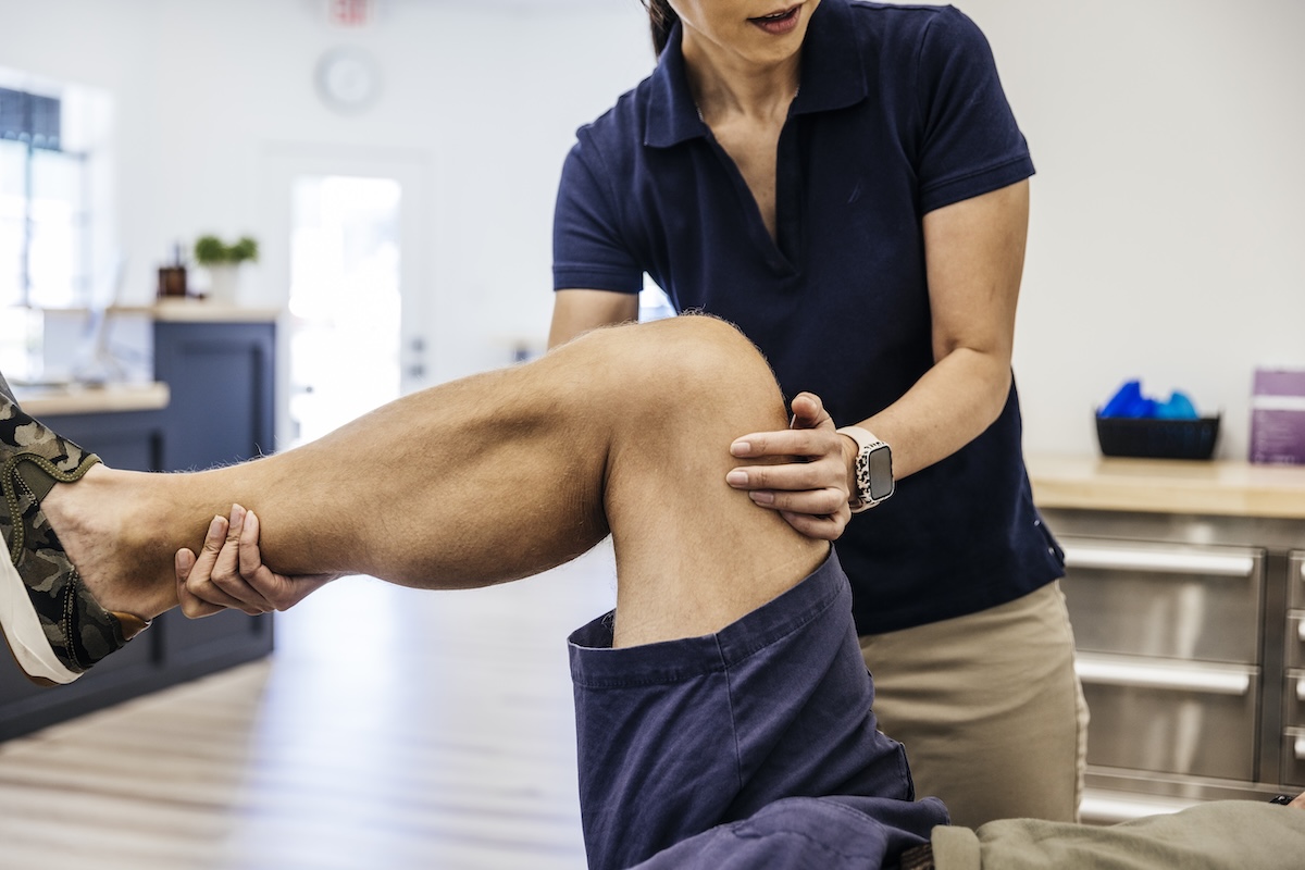 Physical therapy works on a person's knee