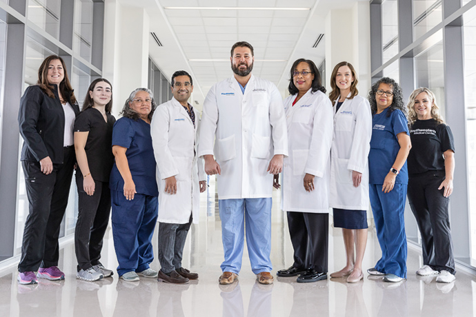 Dr. David B. Nelson with team