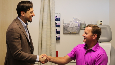 McCade Miller shaking hands with doctor