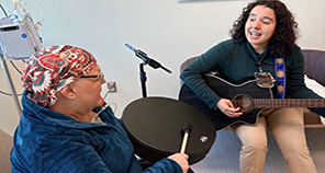 health care professional and patient playing instruments