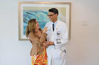 Dr. Albuquerque with patient Maria Snead