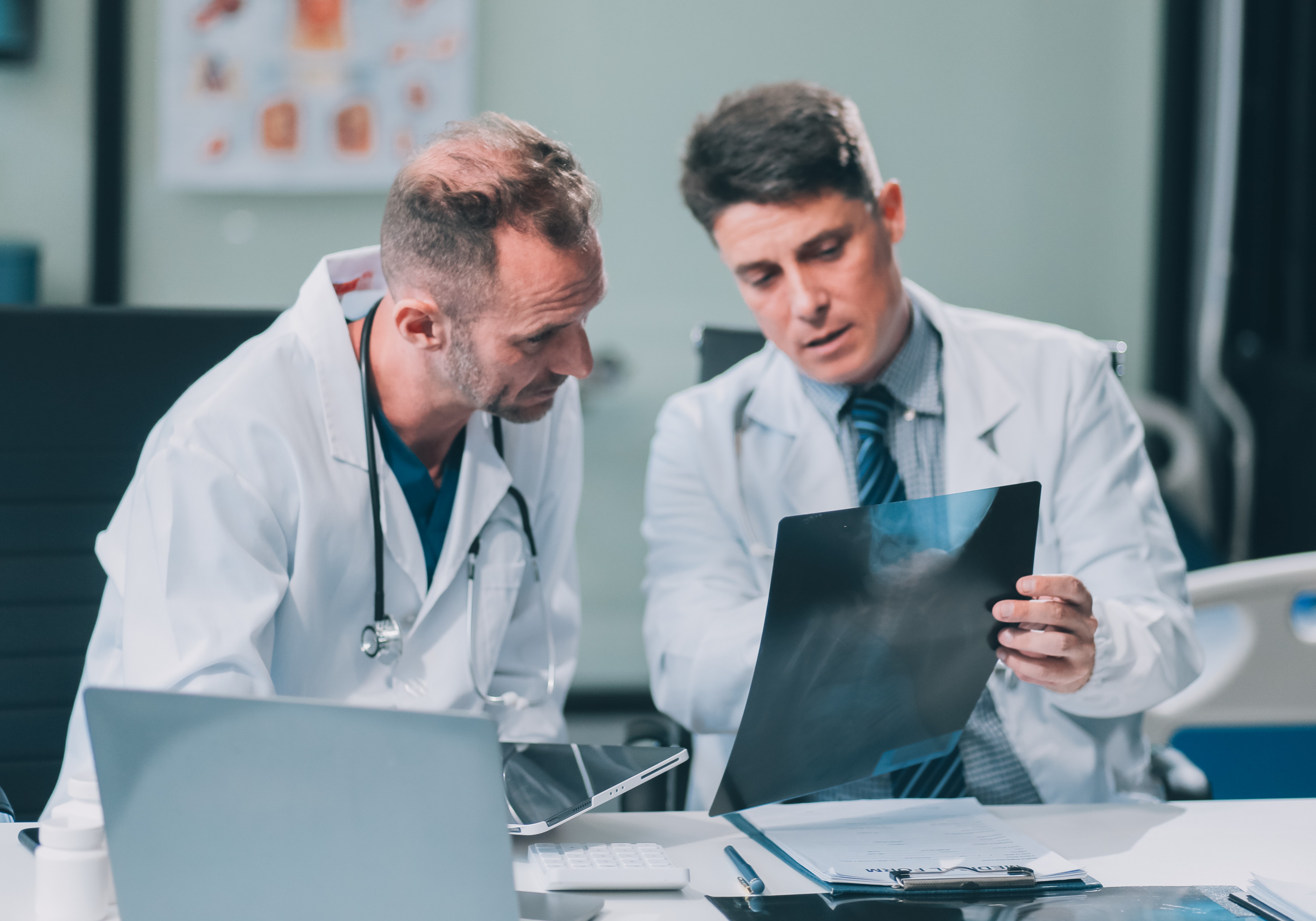 two doctors discussing medical scan