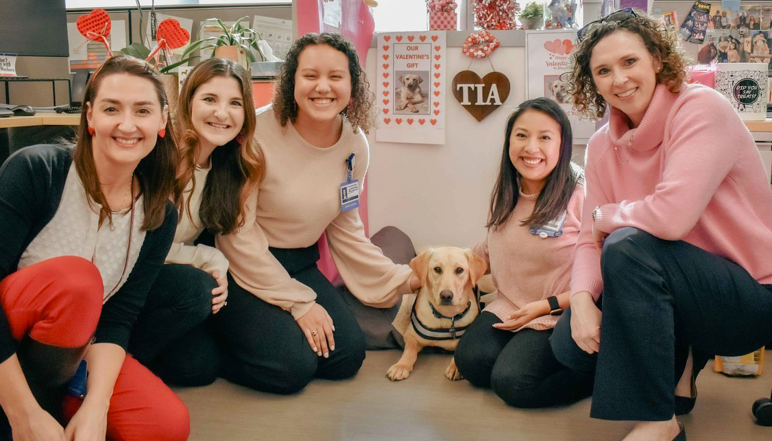 SCCC facility dog, Tia, and Support Services team