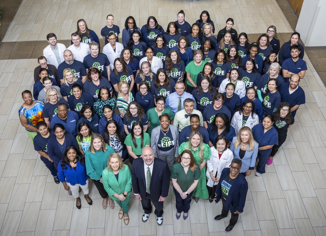 Overhead shot of entire transplant team in Clements University Hospital.