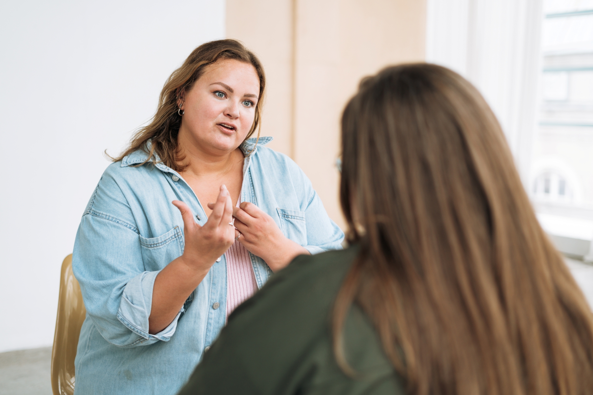 Woman talking with therapist
