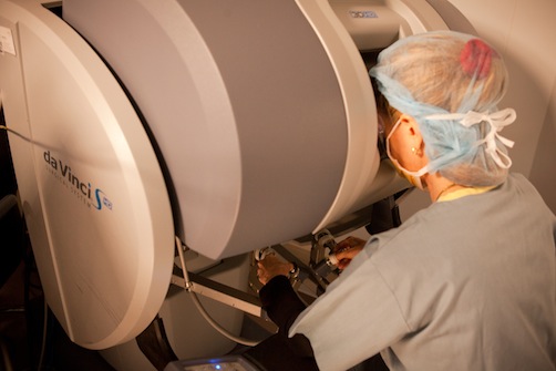 Ellen Wilson, M.D., Associate Professor of the Division of Reproductive Endocrinology & Infertility at UTSW and Medical Director of the Pediatric-Adolescent Gynecology Program at Children’s Medical Center, performing robotic surgery